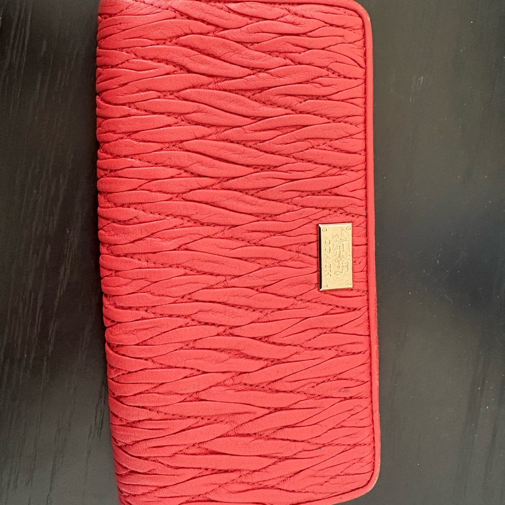Coach coral Textured Accessory with Gold Detail